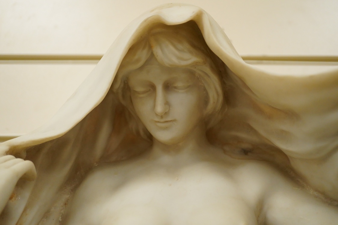 A large simulated marble statuette of a semi nude female, 73cm high